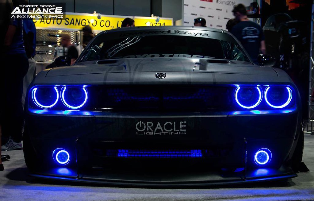 Black Challenger with blue halo headlights.
