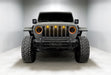 Front end of a Jeep with Oculus Headlights installed, with amber LED halos.
