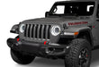 Front end of a Jeep with 7" High Powered LED Headlights installed with white halos on.