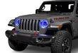 Front end of a Jeep with 7" High Powered LED Headlights installed with blue halos on.