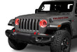 Front end of a Jeep with 7" High Powered LED Headlights installed with red halos on.