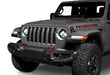 Front end of a Jeep with 7" High Powered LED Headlights installed and turned on.