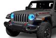 Front end of a Jeep with 7" High Powered LED Headlights installed with cyan halos on.