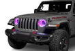 Front end of a Jeep with 7" High Powered LED Headlights installed with pink halos on.