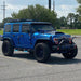 Three quarters view of a Jeep Wrangler with Vector™ Series Grill LED Halo Kit installed.