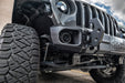 Close-up on the front bumper of a Jeep with High Performance 20W LED Fog Lights installed.