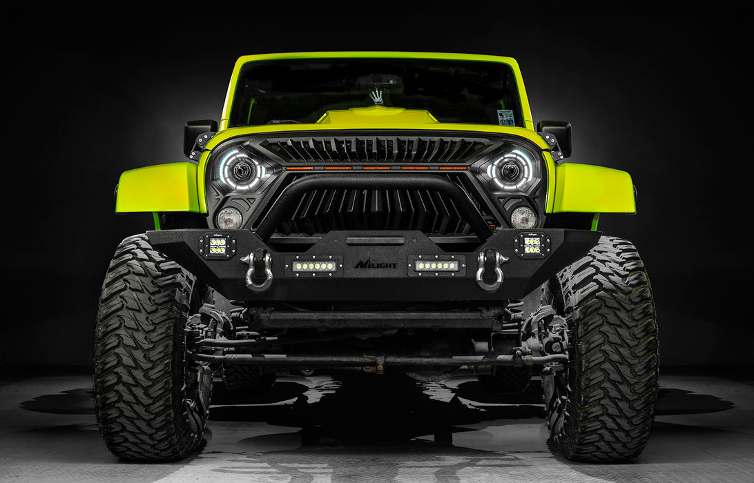 Front view of a yellow Jeep with 7" Oculus Headlights installed, set to white LEDs.