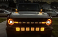 Front end of a grey Ford Bronco with multiple LED lighting products installed, including Oculus Headlights.