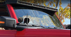 Close-up of a Integrated Windshield Roof LED Light Bar System installed on a red Ford Bronco.