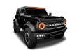Studio shot of a black Ford Bronco equipped with the Integrated Windshield Roof LED Light Bar System.