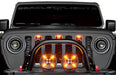 Front grill of a Jeep Wrangler with Universal Pre-Runner Style LED Grill Light Kit installed and amber LEDs turned on.