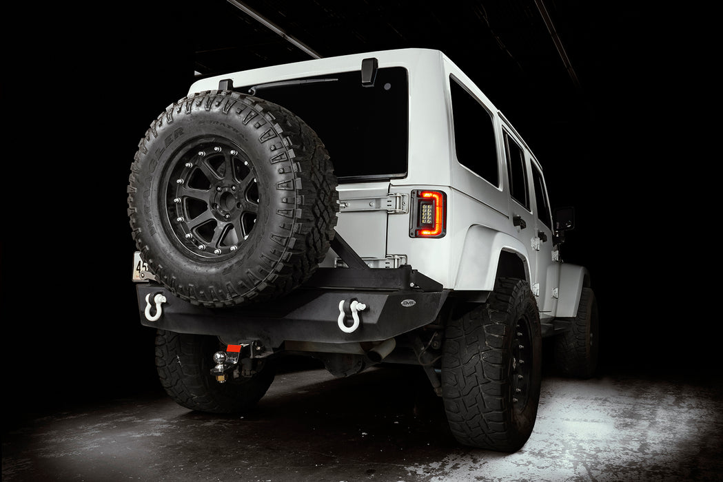 Rear three quarters view of a Jeep Wrangler JK with flush mount tail lights and DRLs on