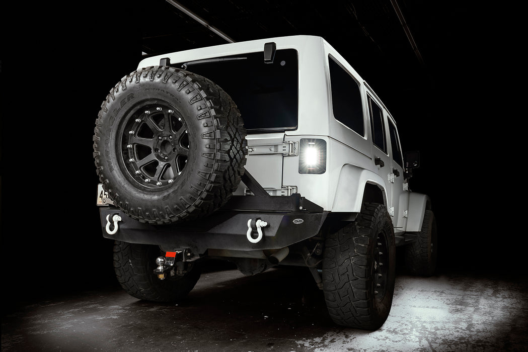 Three quarters view of a Jeep Wrangler JK with flush mount tail lights and reverse lights on