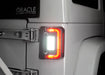 Close up of Jeep Wrangler JK flush mount tail lights installed with reverse lights on
