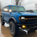 Three quarters view of a blue Ford Bronco with LED Off-Road Side Mirrors installed.