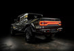 Three quarters view of Jeep Gladiator JT with Racetrack Tailgate brake light on