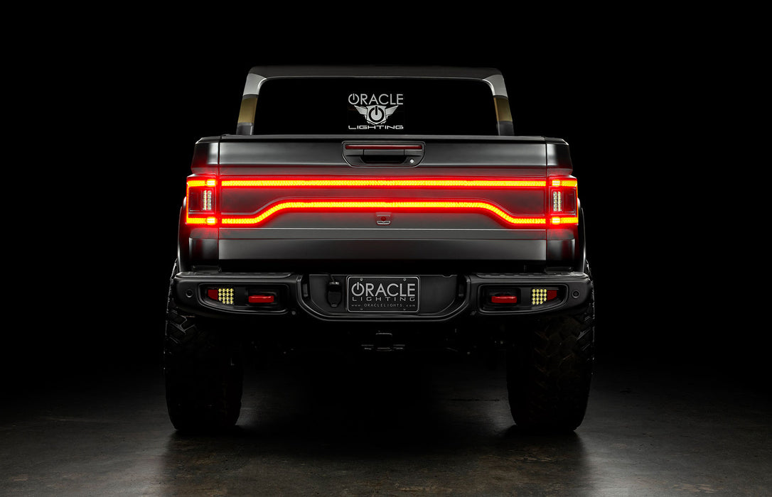 Rear view of Jeep Gladiator JT with Racetrack Tail Gate brake light on