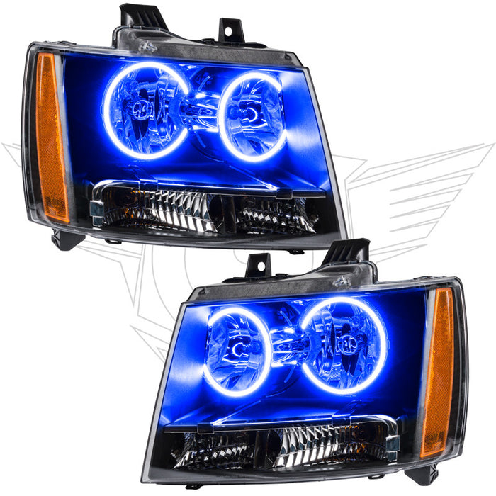 Chevrolet Avalanche headlights with blue LED halo rings.