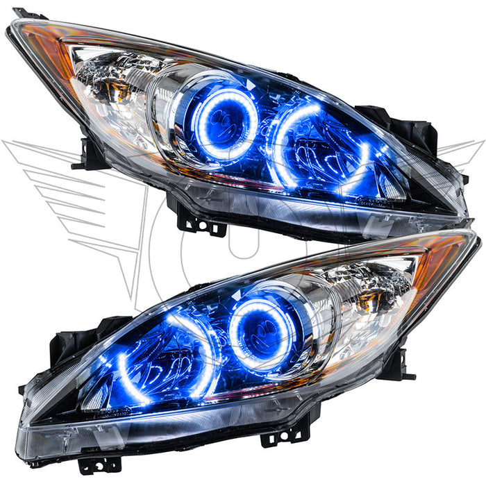 Mazda 3 headlights with blue LED halo rings.