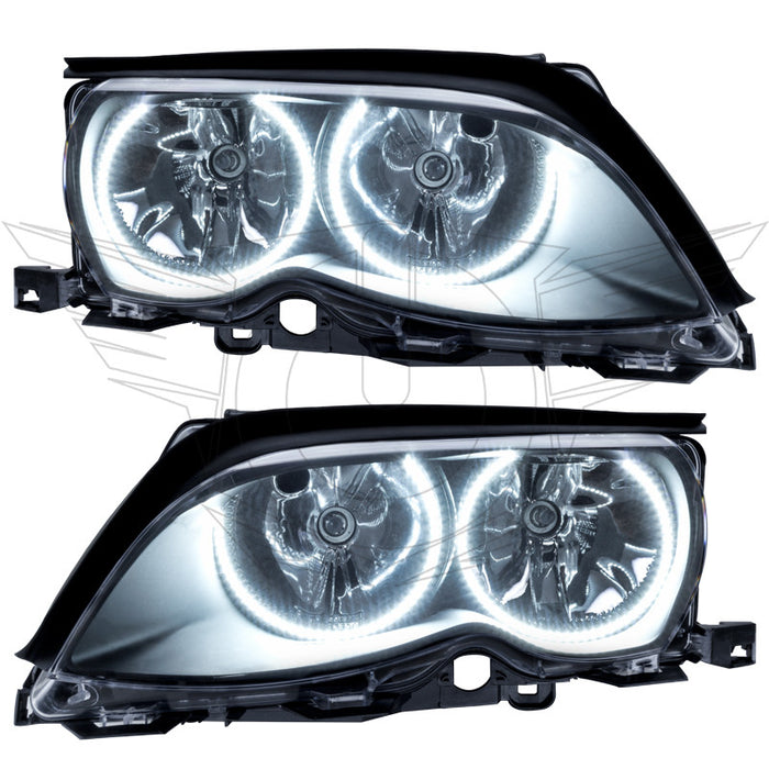 BMW 3 Series headlights with white LED halo rings.