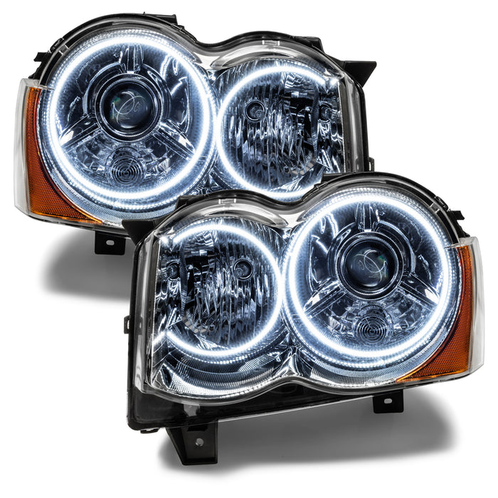 Jeep Grand Cherokee Headlights with white LED halo rings.