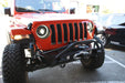 Front end of a Jeep with Oculus Headlights installed.