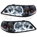 Lincoln Town Car headlights with white LED halo rings.