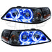 Lincoln Town Car headlights with blue LED halo rings.