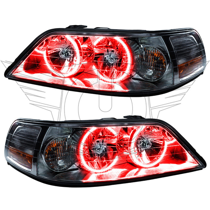 Lincoln Town Car headlights with red LED halo rings.