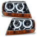 1999-2004 Jeep Grand Cherokee Pre-Assembled Halo Headlights-Black Housing with white LED halo rings.