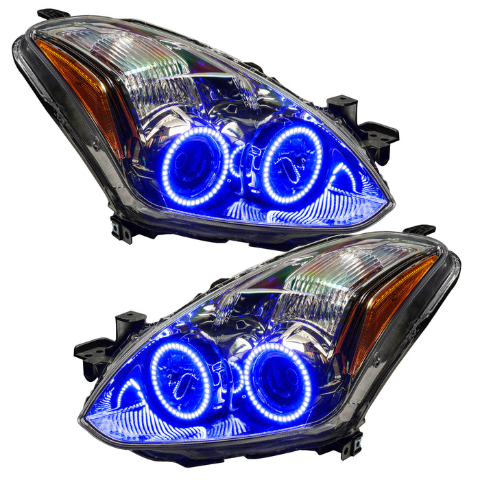 Nissan Altima headlights with blue LED halo rings.