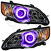 Subaru Legacy headlights with purple halos.