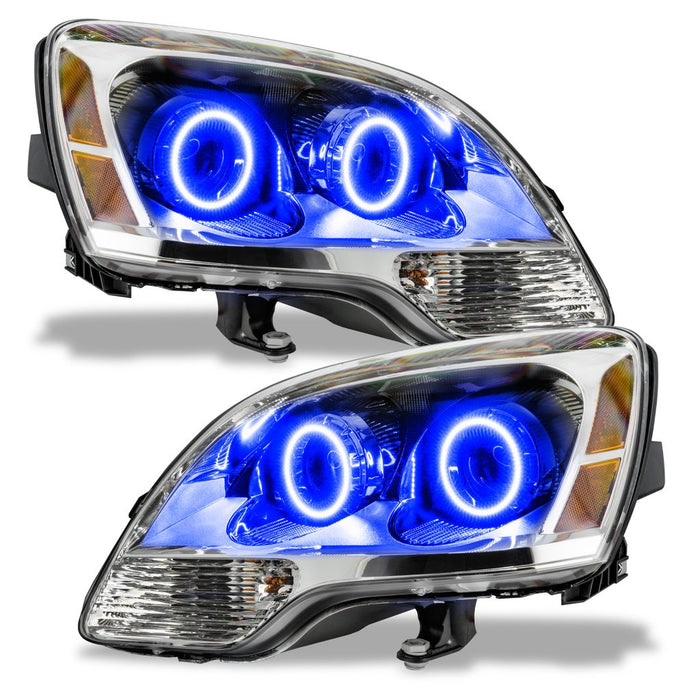 GMC Acadia headlights with blue LED halo rings.