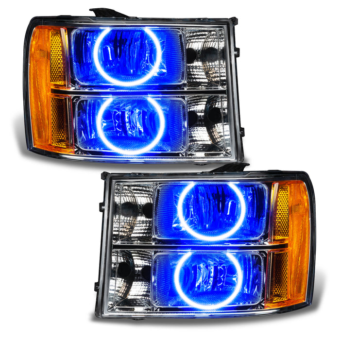 GMC Sierra headlights with blue LED halo rings.