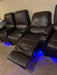 Set of recliners with blue LED lighting underneath