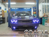 Front end of a Dodge Challenger with purple LED headlight and fog light halo rings.