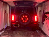 Ford bronco in garage with LED spare tire third brake light installed