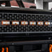 Close-up on the grill of a Ford Bronco with Amber LED Illuminated Letter Badges installed.