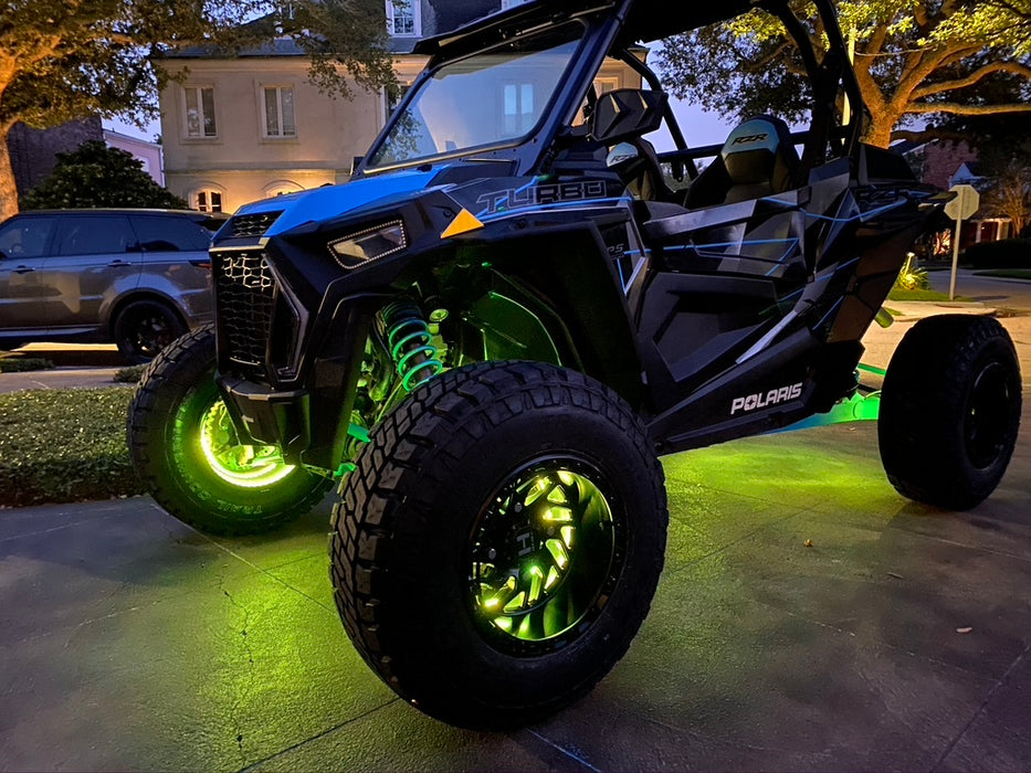 Polaris RZR with illuminated green LED wheel rings
