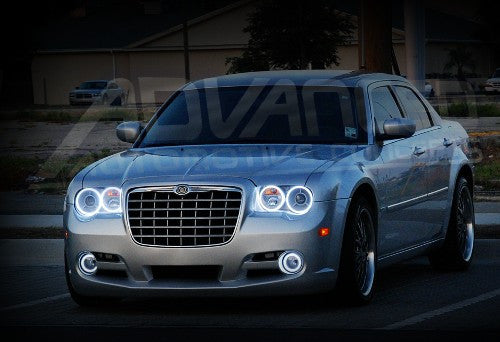 Three quarters view of a Chrysler 300C with white LED headlight and fog light halo rings.