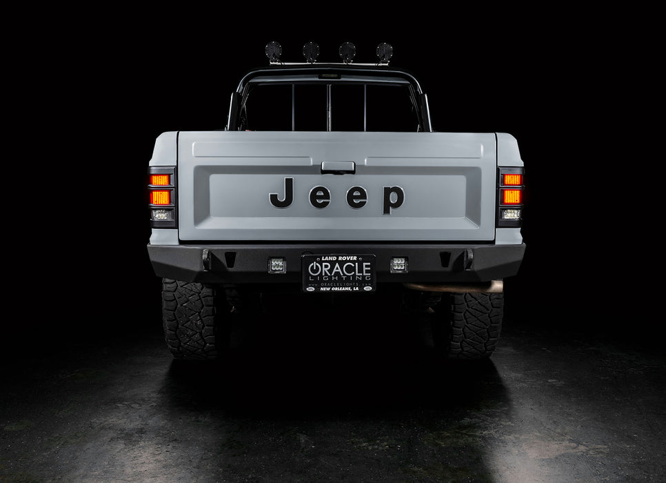 Rear view of Jeep Comanche with flush mount tail lights and DRL on