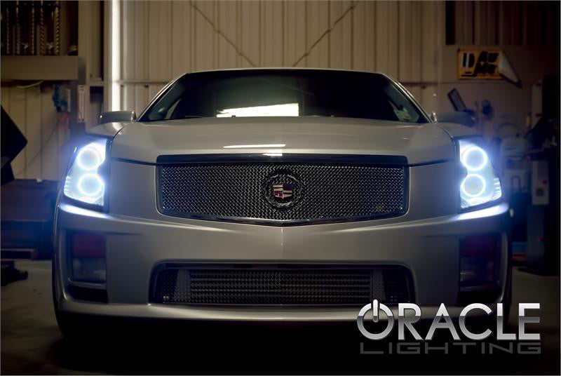 Front view of a Cadillac CTS with white LED headlight halo rings.