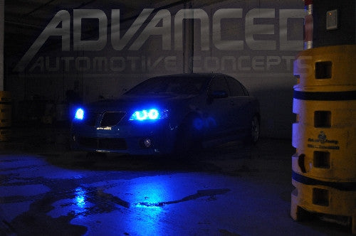 Three quarters view of a Pontiac G8 with blue LED headlight halo rings installed.