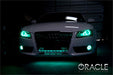 Front end of an Audi A5 with aqua LED headlight and fog light halo rings installed.