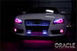 Front end of an Audi A5 with pink LED headlight and fog light halo rings installed.