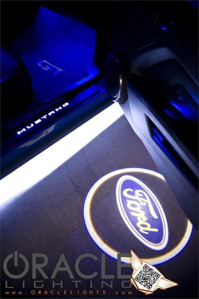 GOBO Projector installed on a car door, projecting the Ford logo.