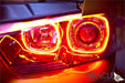 Close-up of charger headlights with amber halos