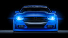 Front end of a Dodge Charger with cyan headlight DRLs.