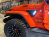 Close-up of Sidetrack™ LED Lighting System installed on a Jeep, with white LEDs on.