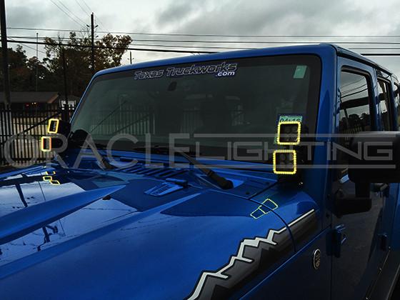 Front of a Jeep with multiple Surface Mount Squared Halo w/ 20W ORACLE LED Spot Lights installed on the dash.